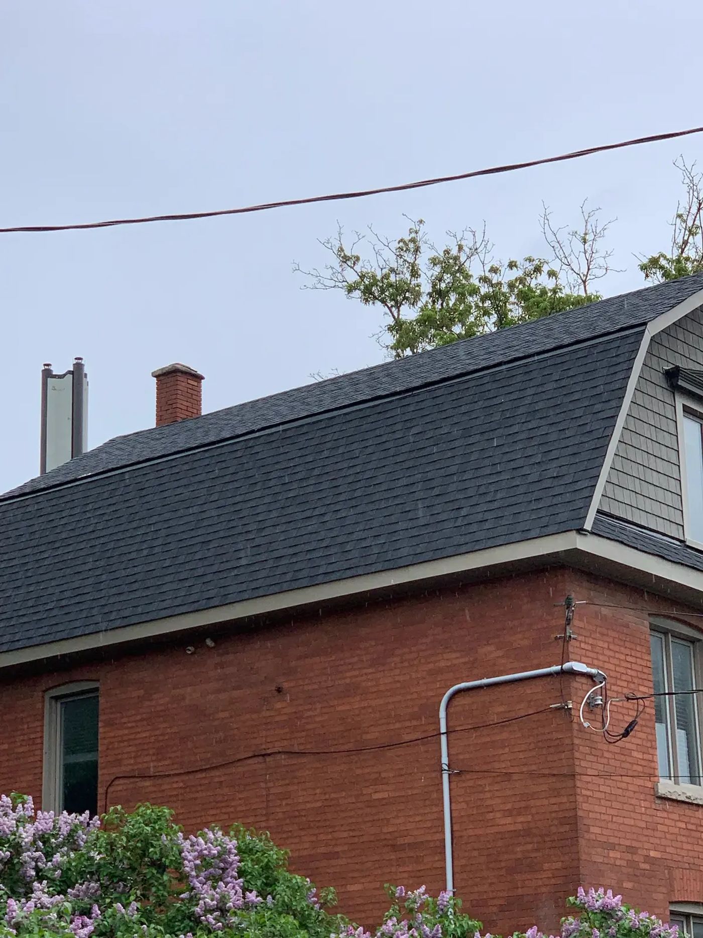 A finished Envelopro roof on a red brick heritage home